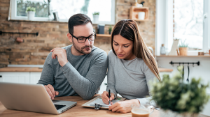 couple reviewing financials and budgeting