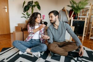 Couple passing money to each other