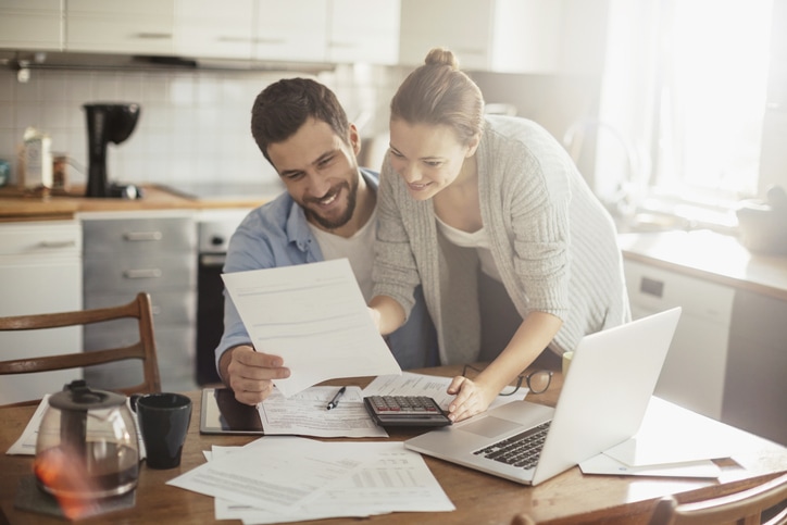 Couple looking at taxes together